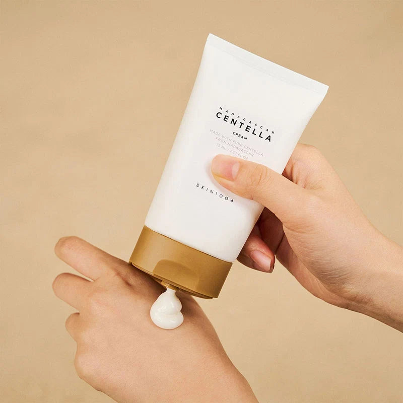 Model applying Skin1004 Madagascar Centella Cream to hand