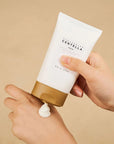 Model applying Skin1004 Madagascar Centella Cream to hand