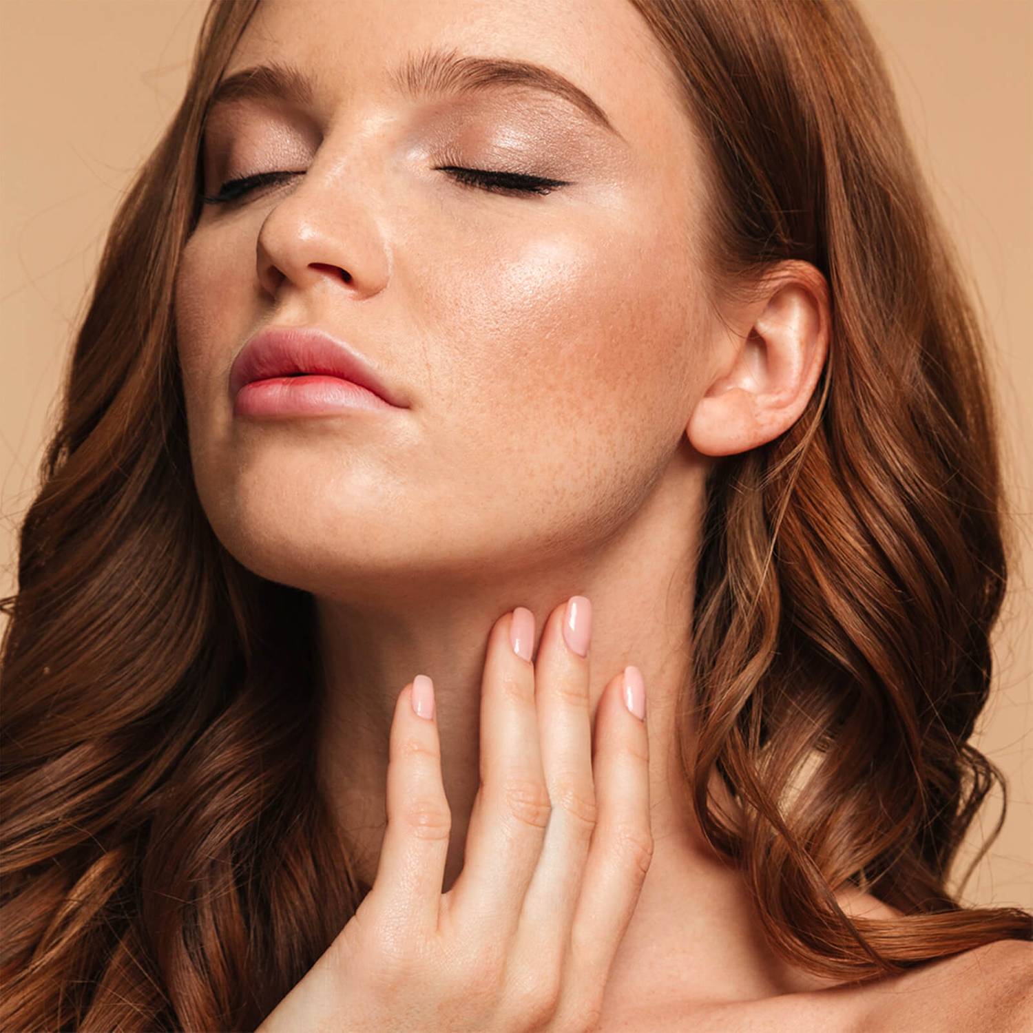 Red hair model wearing NOTE Luminous Moisturizing Foundation