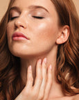 Red hair model wearing NOTE Luminous Moisturizing Foundation