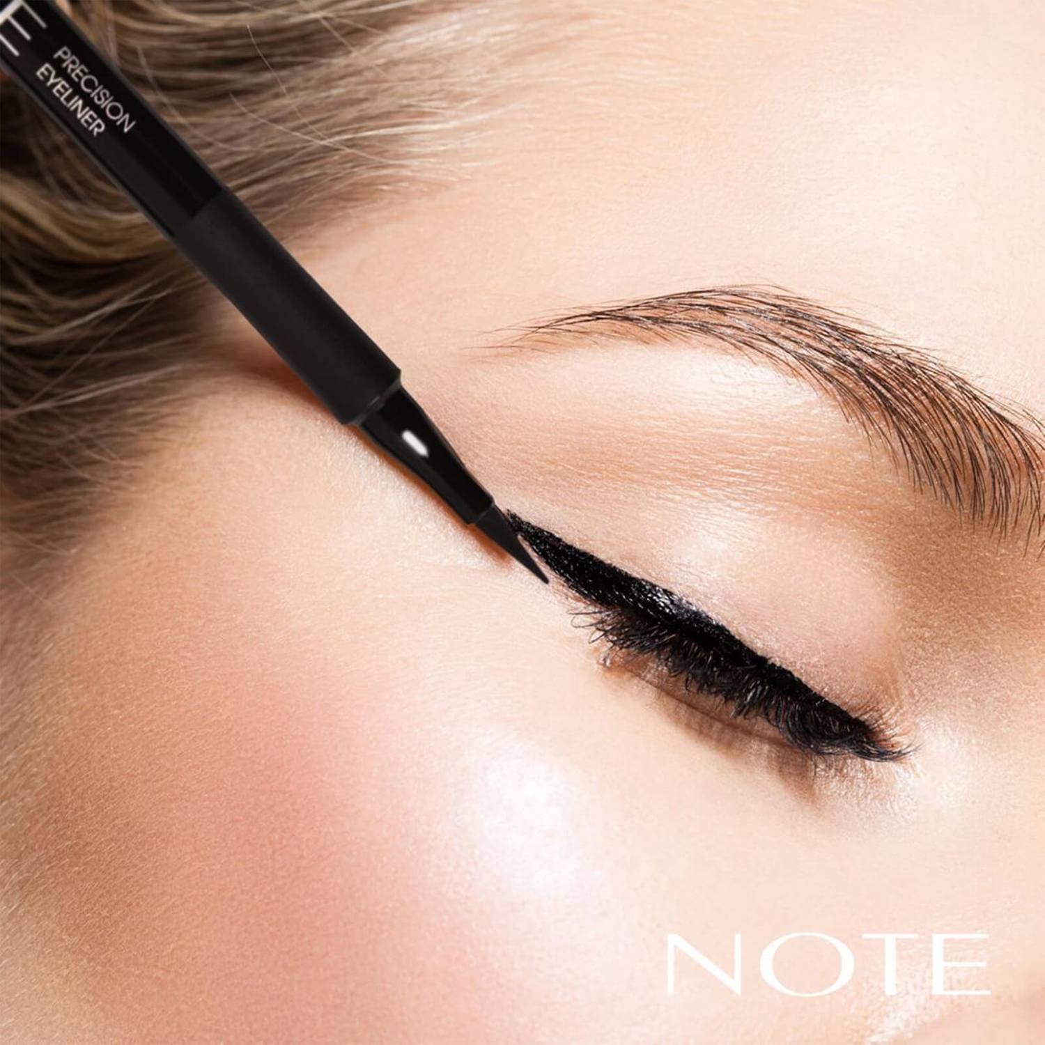 Model #1 wearing NOTE Precision Eyeliner