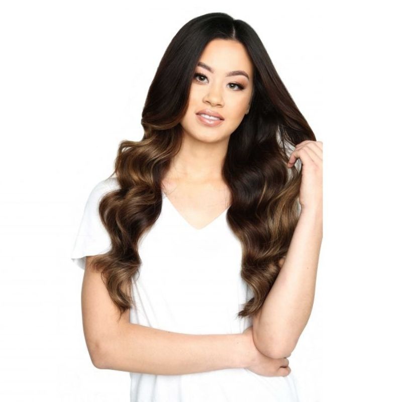 Model wearing Beauty Works 20&quot; Deluxe Remy Instant Clip-In Extensions
