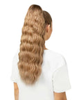 Model wearing Beauty Works 20" Invisi-Ponytail Beach Wave, back view