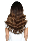 Beauty Works 20"Model wearing Beauty 20" Deluxe Remy Instant Clip-In Extensions, back view
