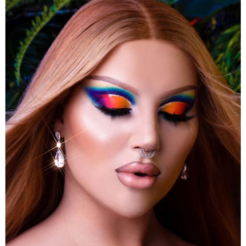 Model wearing colourful cut crease using bPerfect X STACEY MARIE – CARNIVAL III LOVE TAHITI PALETTE