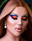 Model wearing colourful cut crease using bPerfect X STACEY MARIE – CARNIVAL III LOVE TAHITI PALETTE