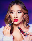 Model using bPerfect Poison Apple Christmas Lip Kit