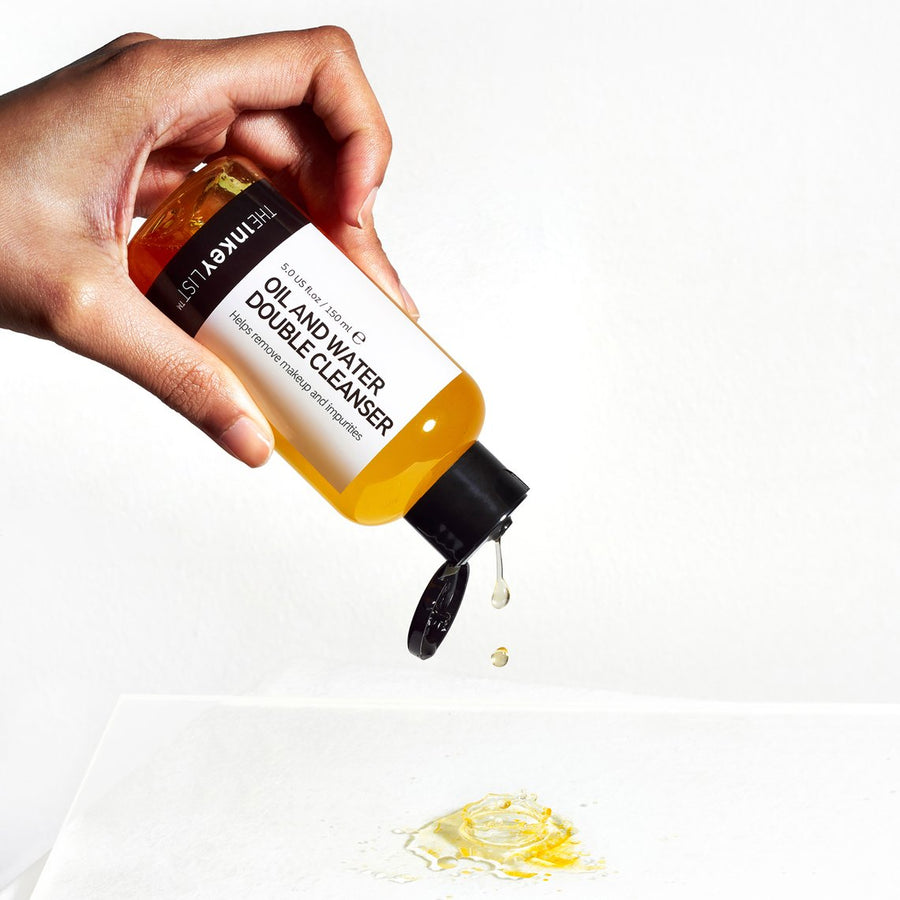Model holding The Inkey List OIL & WATER DOUBLE CLEANSER