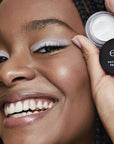 Model using elf Putty Eye Primer - White