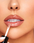 Model wearing INGLOT Rosie For Inglot Luminous Crystal Lip Glaze - Luminous Nude