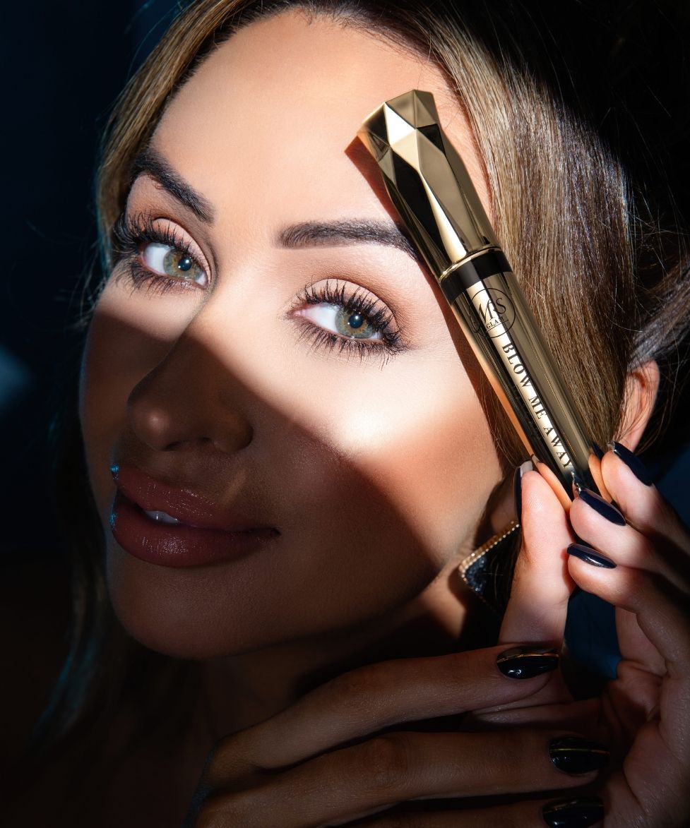 Model using Mrs Glam Blow Me Away Mascara