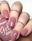 Model holding LA GIRL BARE IT ALL Gel Polish