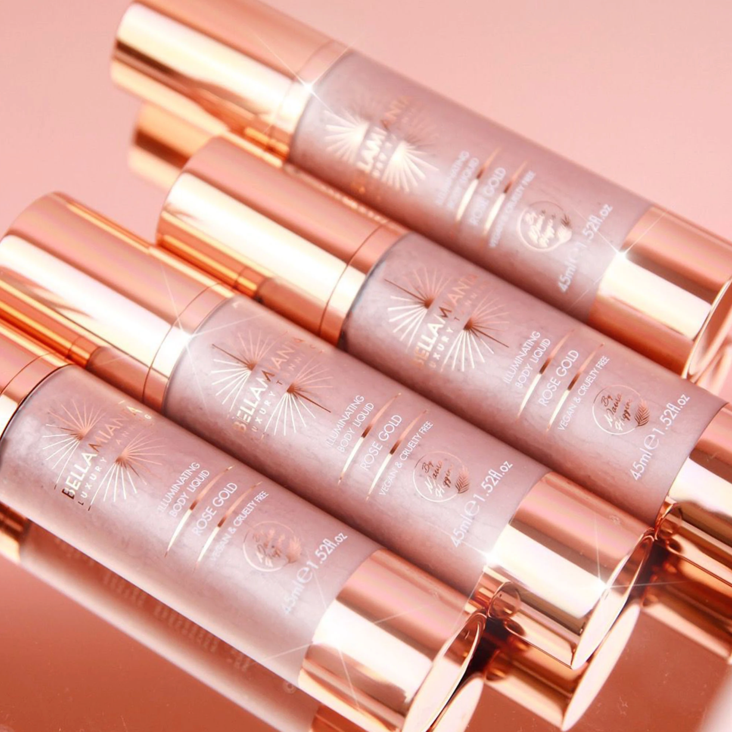 BELLAMIANTA Illuminating Body Liquid by Maura Higgins in Rose Gold