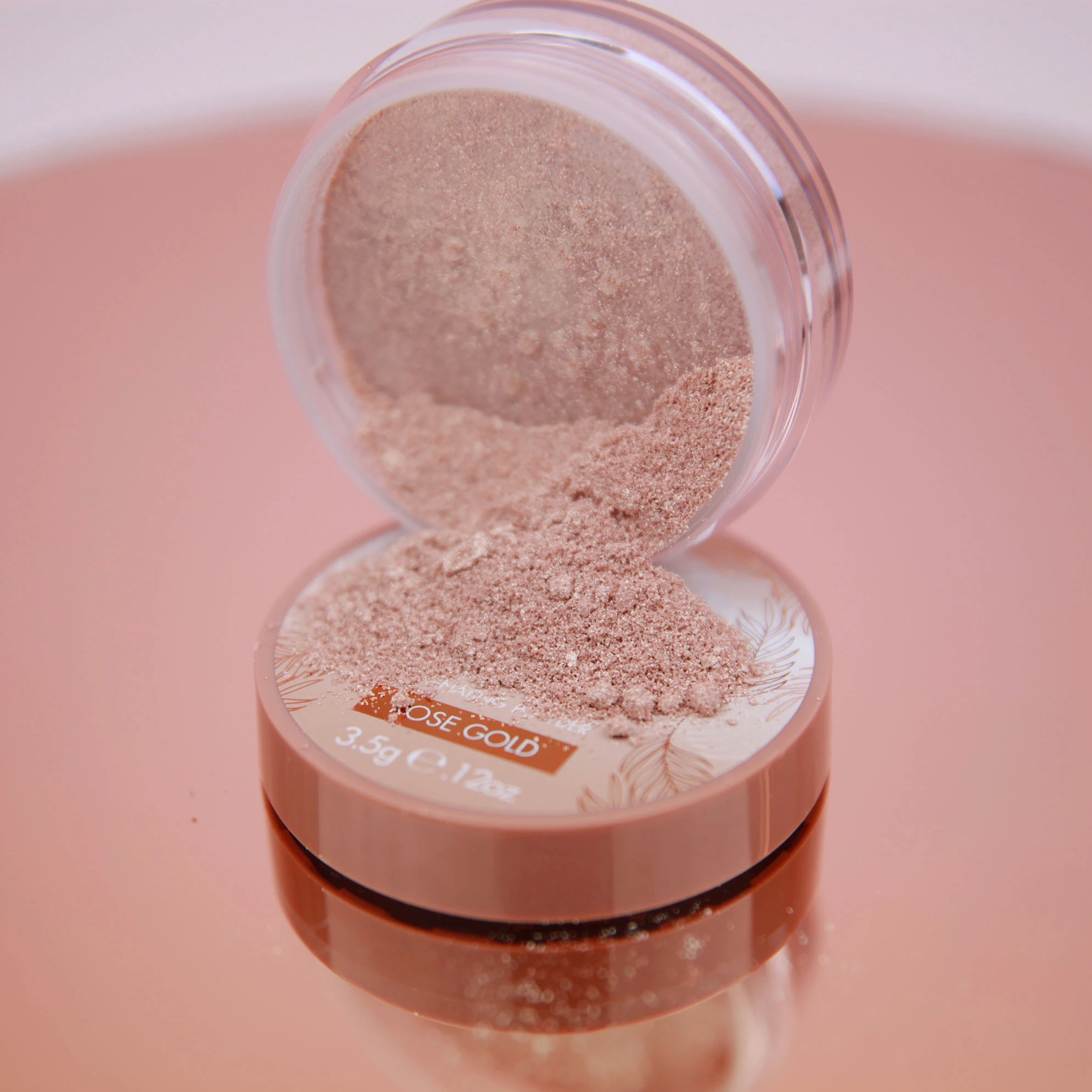 BELLAMIANTA Illuminating Powder by Maura Higgins Rose Gold, open