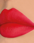 Model wearing DOLL BEAUTY Doll Lipstick - Red Between The Lines