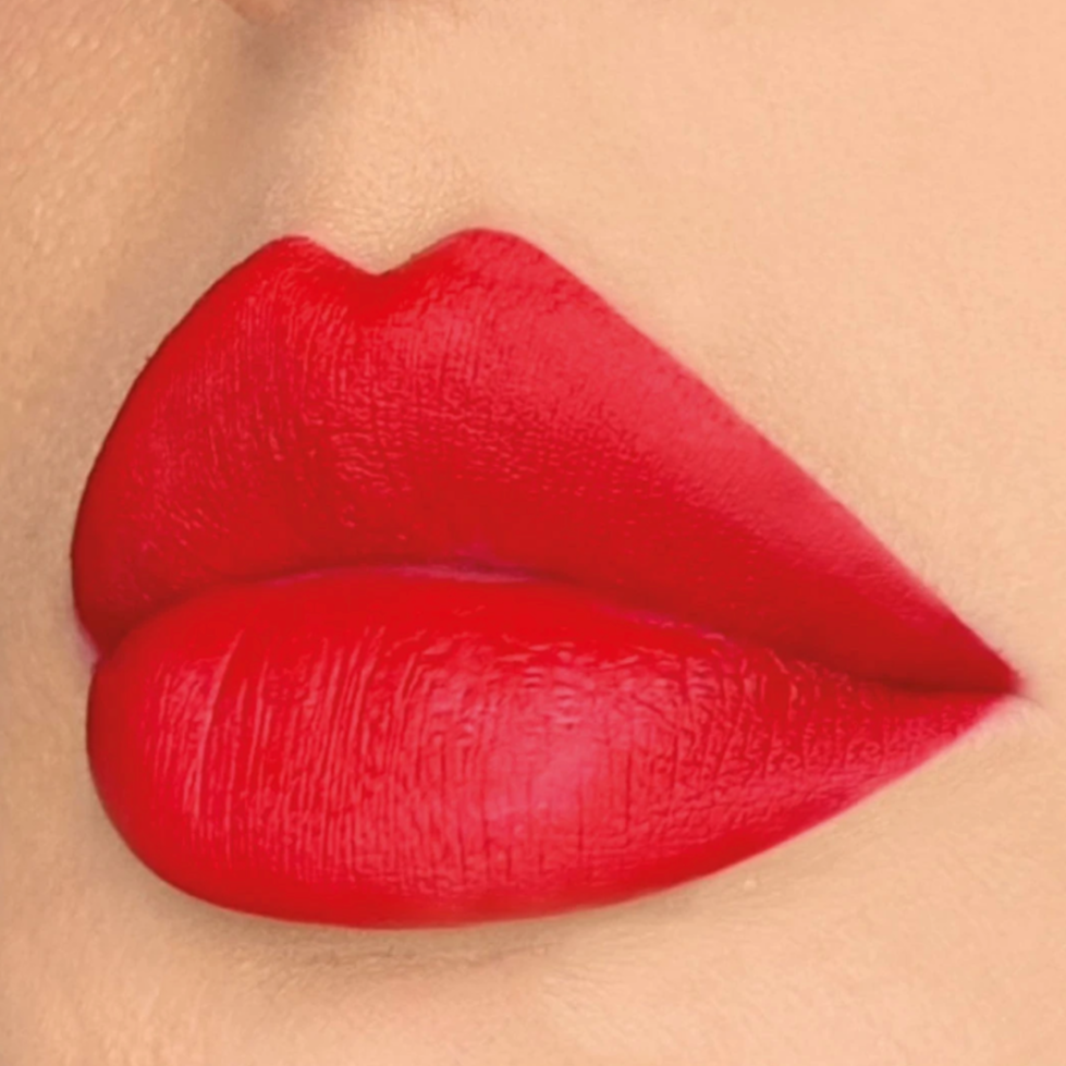 Model wearing DOLL BEAUTY Doll Lipstick - She&#39;s Well Red