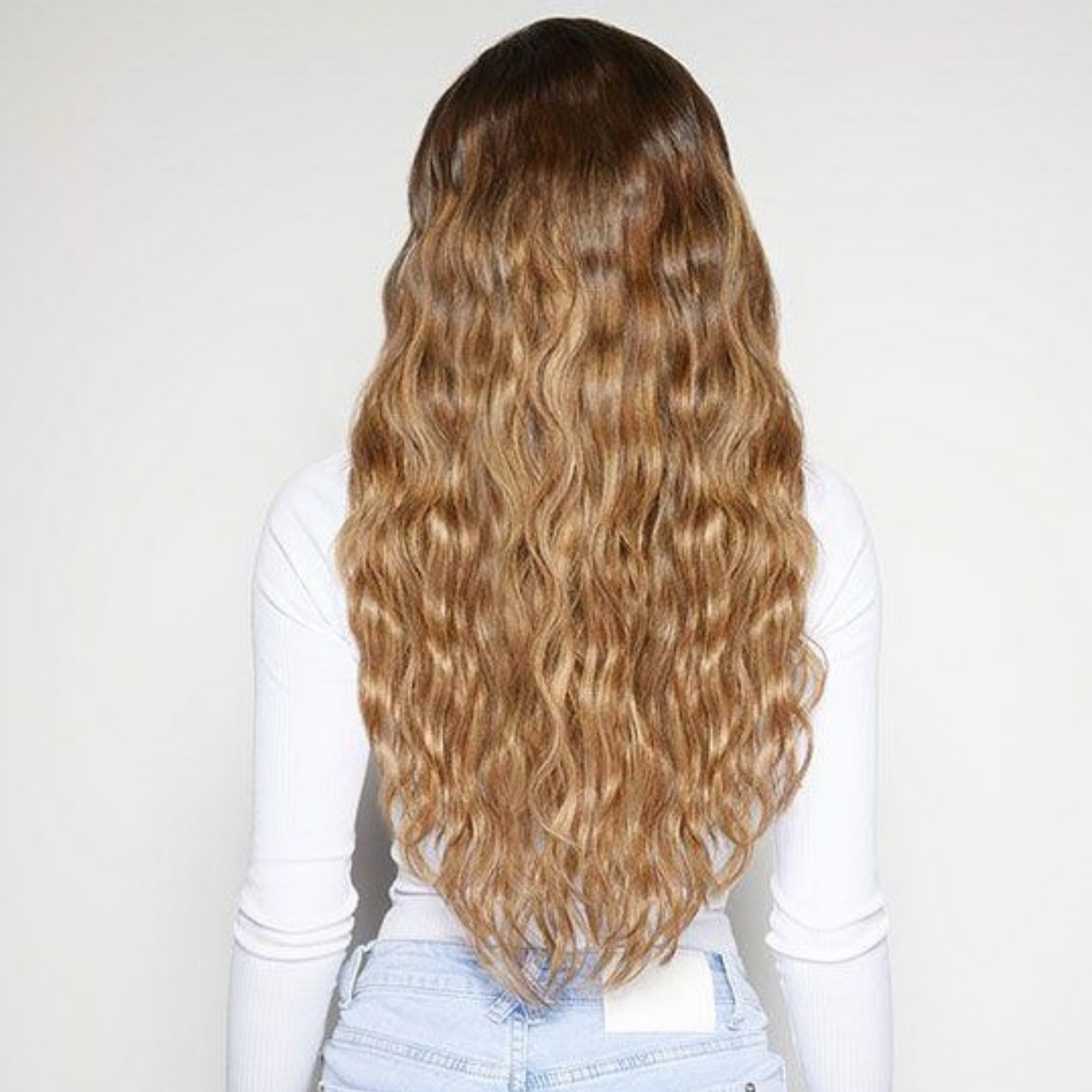Model hair styled with BEAUTY WORKS Jumbo Waver, back view