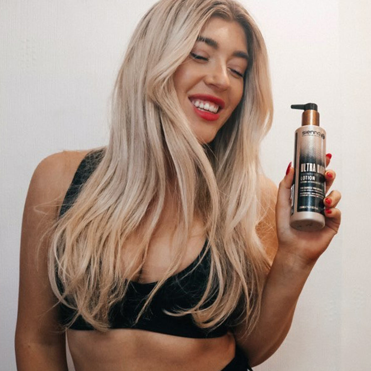 Model wearing Sienna X Ultra Dark Self Tan Lotion 200ml