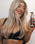 Model wearing Sienna X Ultra Dark Self Tan Lotion 200ml